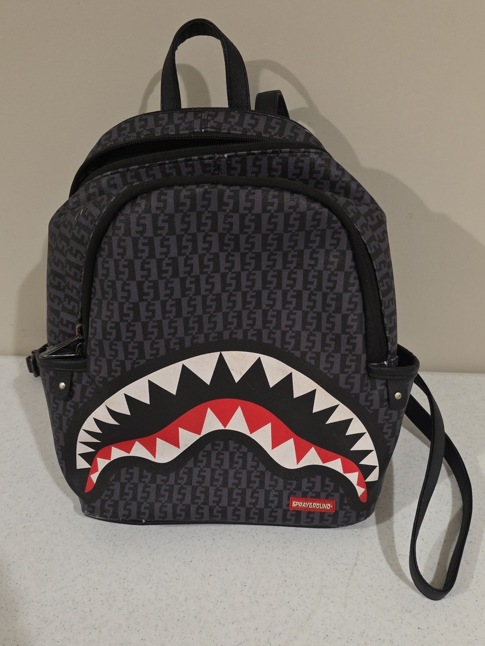 Sprayground Black Mini Backpack with Red & White Shark Mouth
